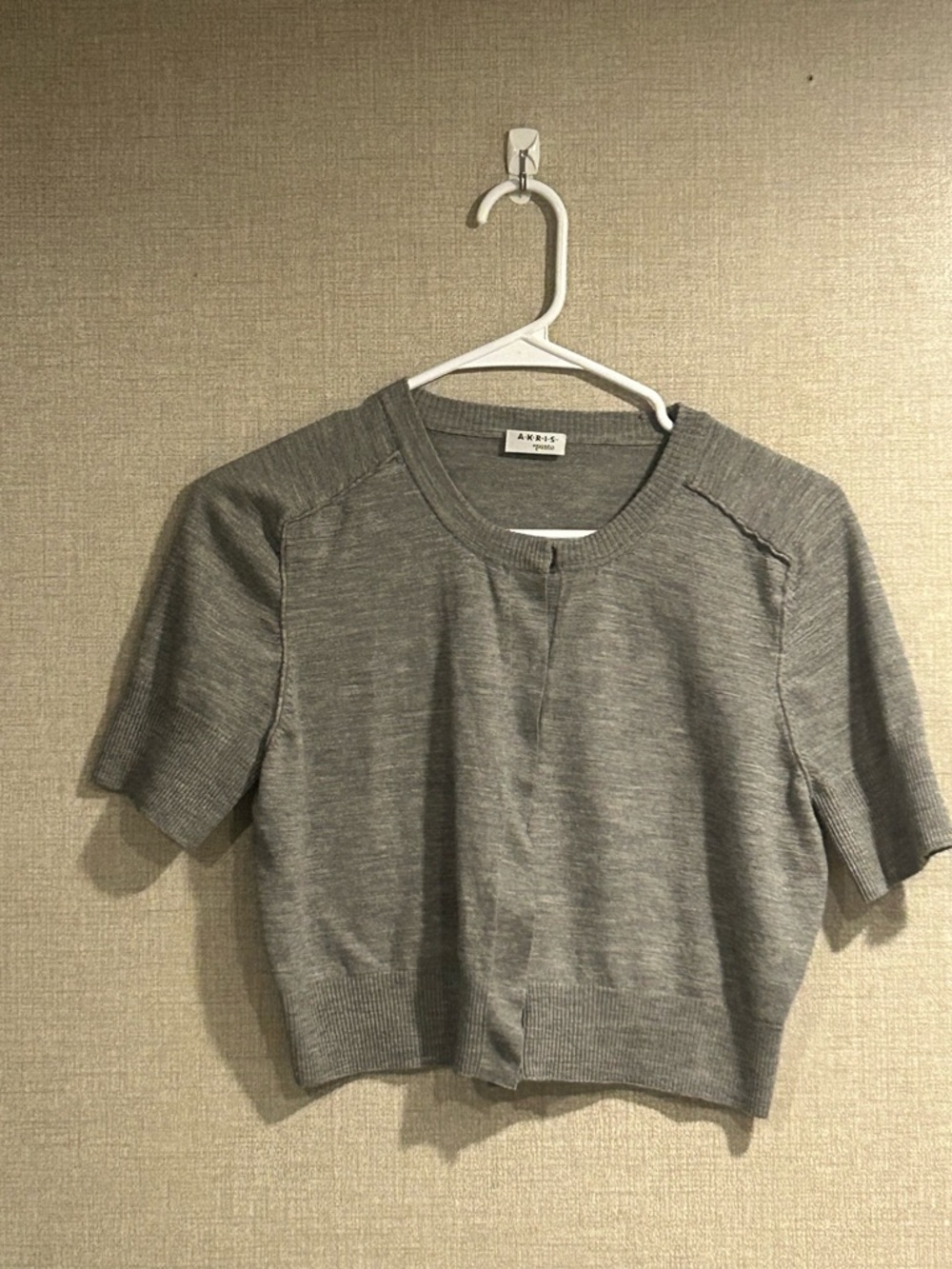 Akris Punto crop top, designer net, soft wool blend, minimalist, luxury.
